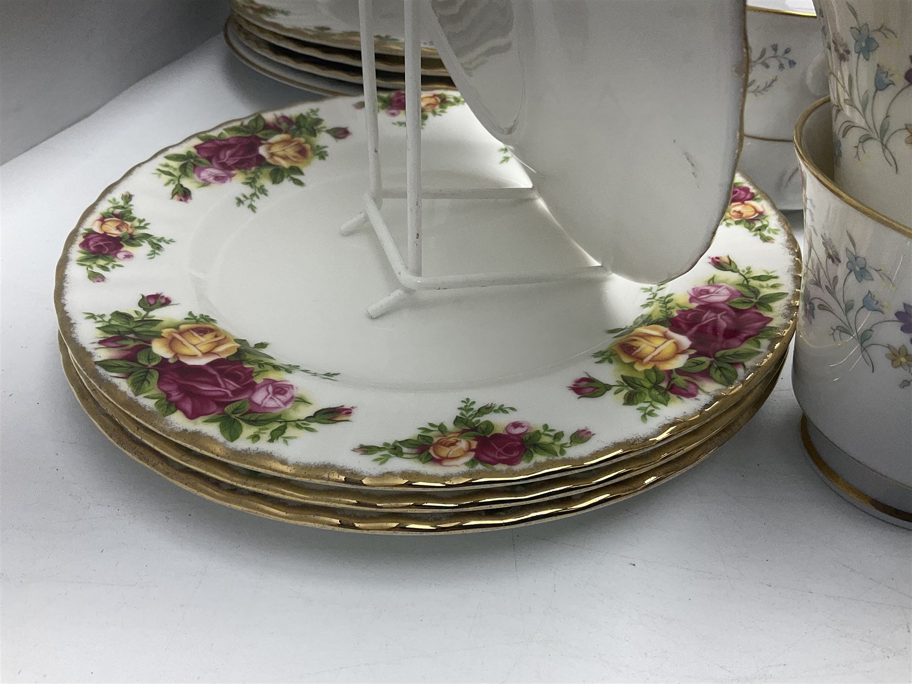 Royal Albert Old Country Roses pattern dinnerwares, to include four dinner plates, four cups and saucers etc, together with Noritake tea service 