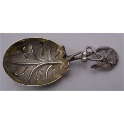 Unusual Victorian silver caddy spoon, the oval parcel gilt bowl embossed with leaf, leading to a flower head mounted tendril handle also detailed with leaf, hallmarked Hilliard & Thomason, Birmingham 1853, L8.5cm, approximate weight 0.49ozt (15.3 grams)