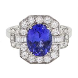 18ct gold oval tanzanite, round and baguette cut diamond cluster ring, stamped 750, tanzanite approx 1.85 carat, total diamond weight approx 0.70 carat