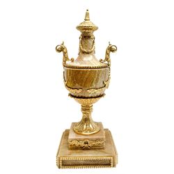 Neo Classical style pink marble urn with gilt metal mounts, the body with twin scrolling handles and foliate swags, upon socle and square stepped base, H49cm