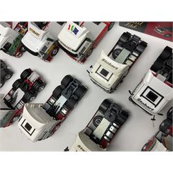 Eddie Stobart - three Oxford Die-Cast Super Rugby League lorries in perspex display cases including the two Hull Clubs; two Lledo Vanguard vans; two Days Gone vans; and Saico Truck & Trailer; all boxed; together with fourteen unboxed Corgi and other tractor/cab units etc (23)