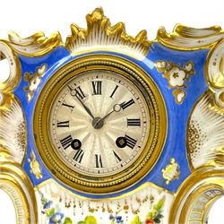 Early 19th century c1820 continental porcelain mantle clock in the Sevres Rocco style, decorated to the front with fired gilding and hand painted bouquet of flowers on a blue and white background, with a French two-train eight-day countwheel striking  movement and silk suspension, striking the hours and half-hours on a silvered bell, 2-1/2” silvered dial with roman numerals, minute track and steel moon hands within a beaded unglazed bezel. With pendulum.
 

