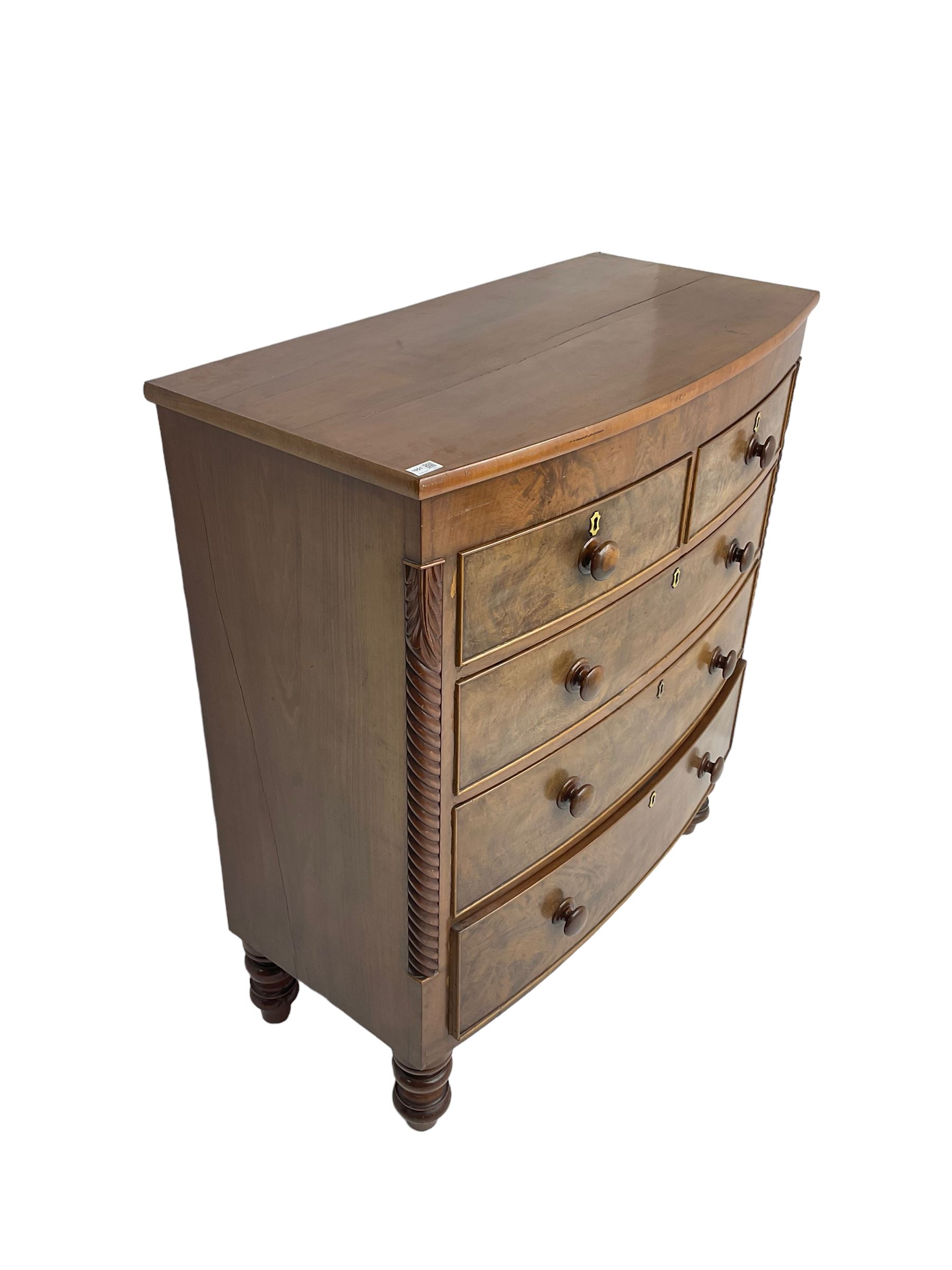 Late 19th century mahogany bow-front chest, fitted with two short drawers over three long drawers each with cockbeaded fronts, raised on turned feet