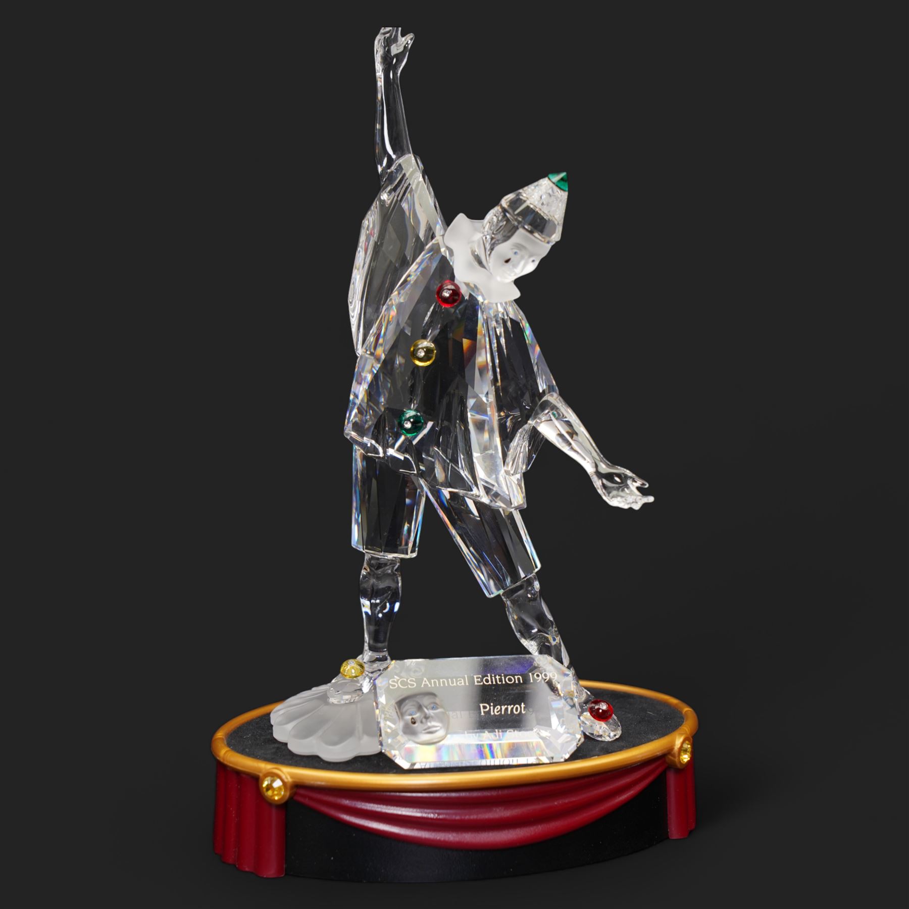 Swarovski crystal 'Masquerade' trilogy; 1999 Masquerade Pierrot, 2000 Columbine, 2001 Harlequin all with accompanying plaque, stand and original box