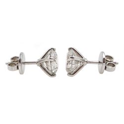 Pair of 18ct white gold diamond stud earrings, stamped 750, diamond total weight approx 3.50 carat