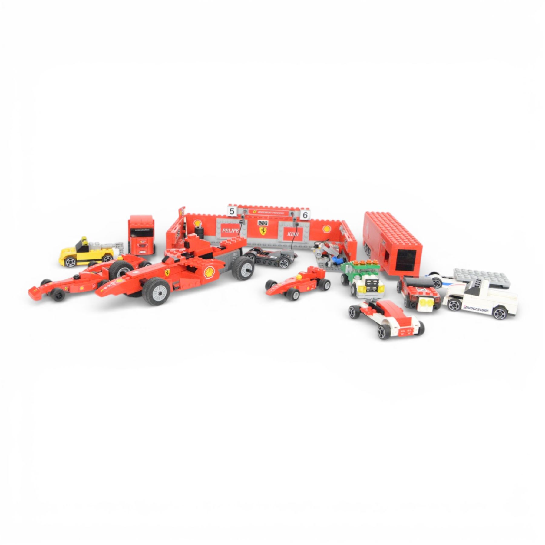Lego Racers set Ferrari F1 Pit no. 8155, further racing related Lego pieces, all partially built, unboxed with instructions