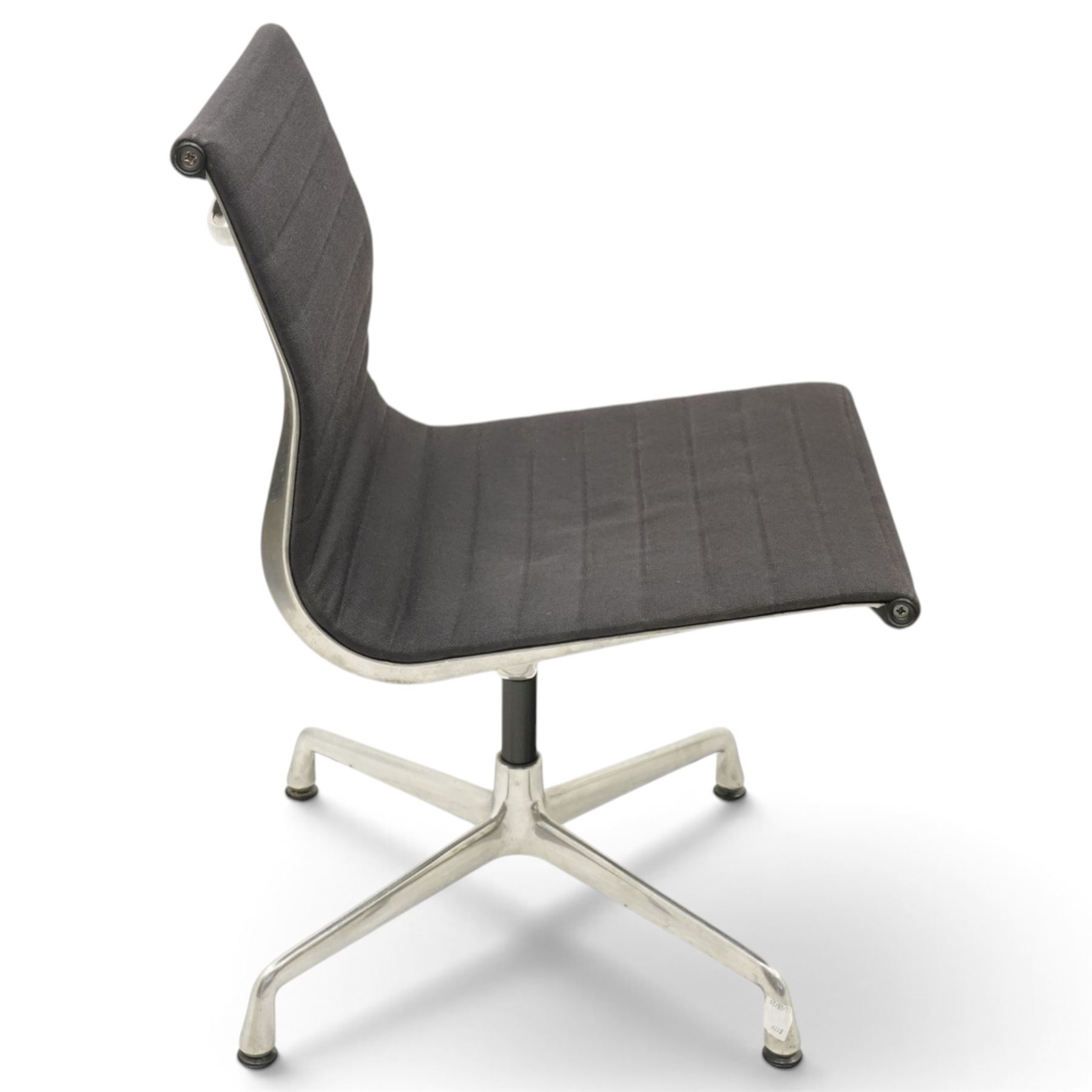 Charles and Ray Eames for Vitra - EA 105 chrome swivel chair upholstered in navy blue, raised on a four point chrome base
