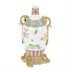 Chinese Famille Rose bottle neck vase, decorated in polychrome enamels with flowering and ...
