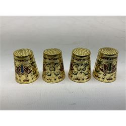Twenty cloisonné thimbles, decorated with birds, flowers, pigs and dragons