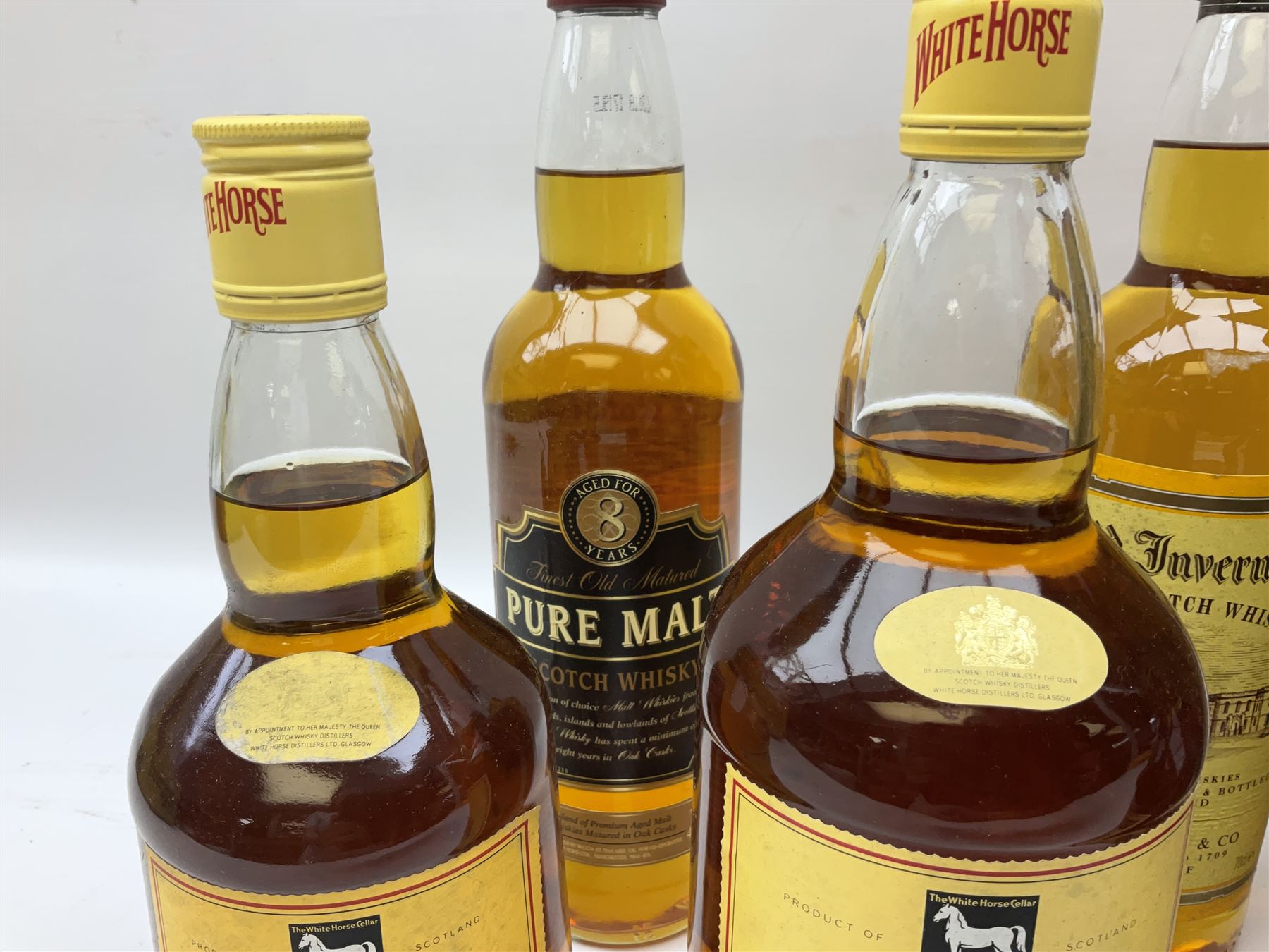 Mixed alcohol comprising Old Inverness Aged Scotch whisky, J.G.Thomson