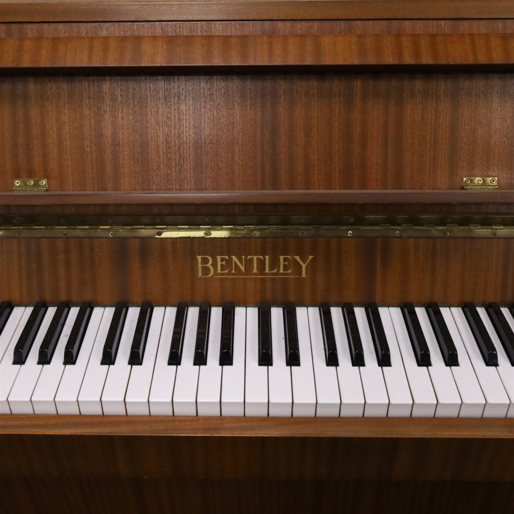 1970s Bentley upright piano, with teak effect veneer, serial no. 138837, H100cm