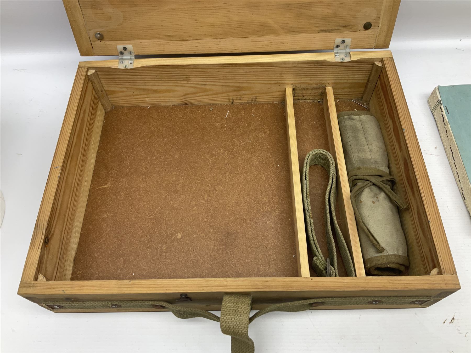 Collection of nineteen British Army booklets 1940s - 1970s including Small Arms Training 1944, various Infantry Training, Cadet Training Manual 1978, Signal Training, Commander's Aide Memoires etc; 1950s blue beret with Yorks Brigade badge; part travelling toilet set in cloth roll; all contained in pine box with webbing straps