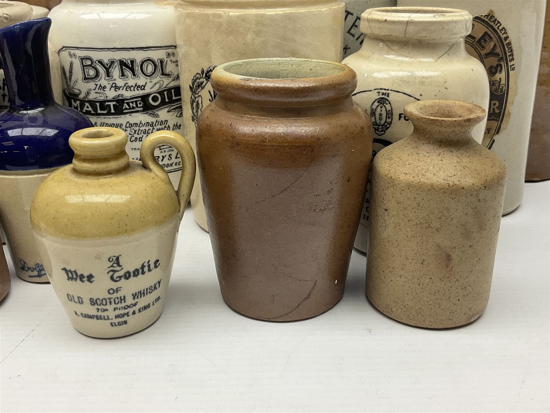 Julius Peters Hull stoneware bottle and a collection of other stoneware advertising bottles, jars and flagons etc