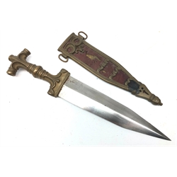  Late 19th century Eastern brass dagger, 23cm twin edge tapering steel blade, brass hilt cast with scrolls, shaped grip and T shaped pommel, L35.5cm, brass scabbard cast with crescents and with silk panel front,   