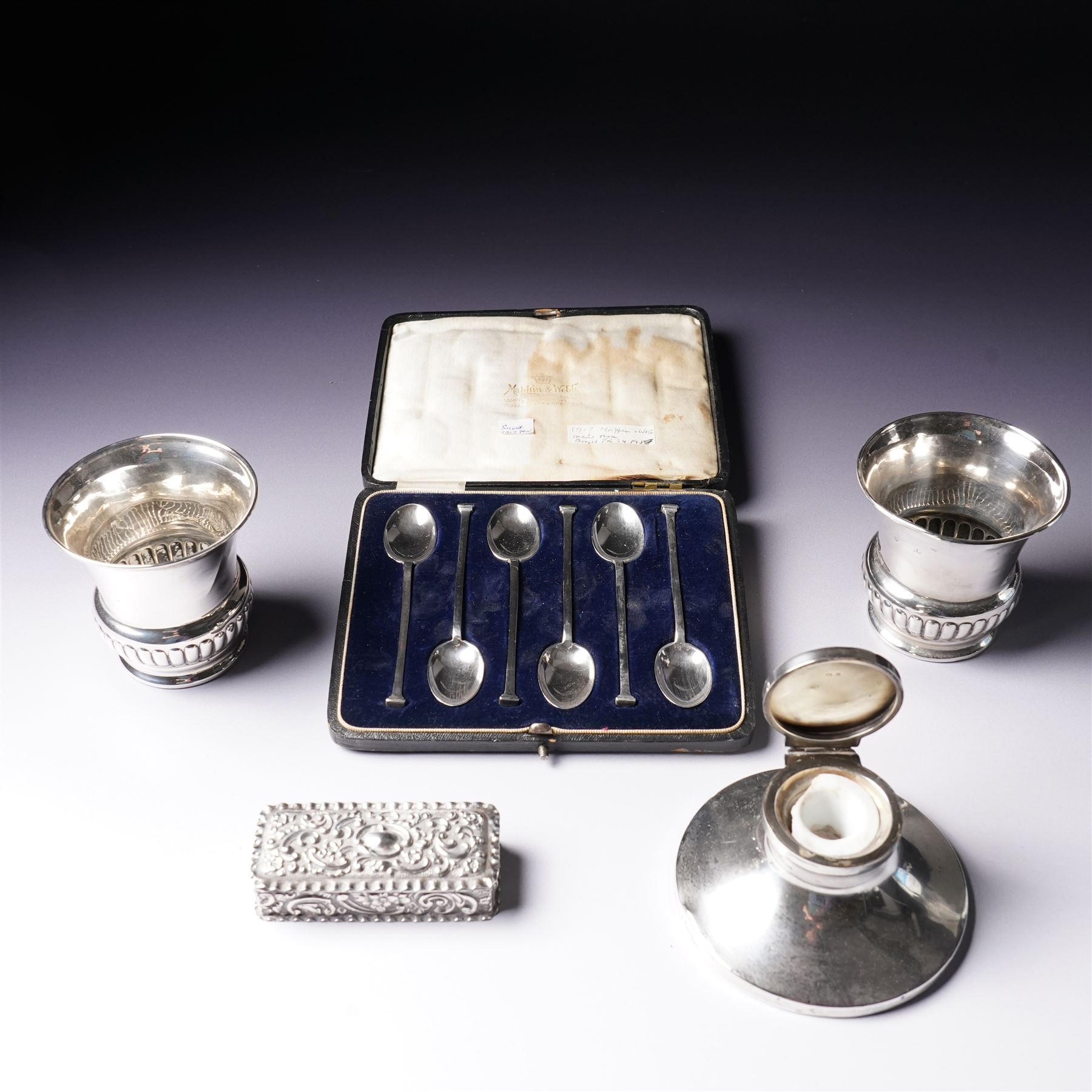Pair of small silver vases H8cm London 1912, silver circular inkwell Birmingham 1912, cased set of six silver coffee spoons and a small silver dressing table box