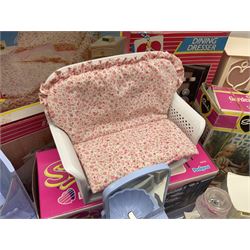 Sindy - furniture and accessories comprising dining suite with separate dresser; two beds; Garden Set; Music Centre; all  boxed; three-piece bedroom suite; settee; Hostess Trolley; two coffee tables; and four-piece bathroom suite including shower cubicle