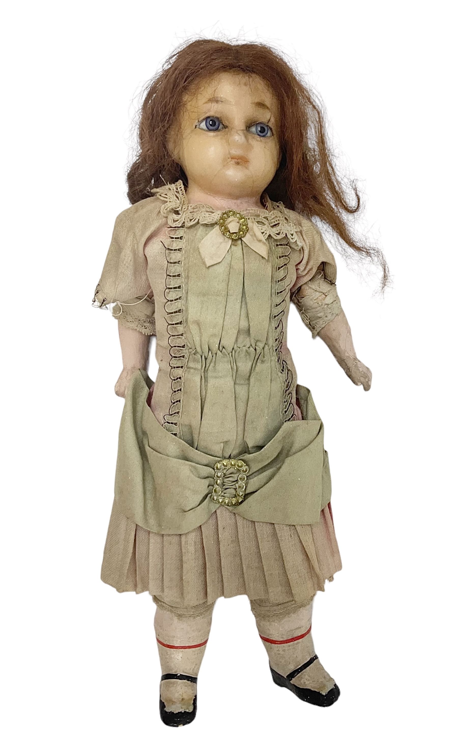Victorian wax shoulder head doll with applied hair, inset glass eyes and jointed body with composition lower limbs; faded pink dress H35cm