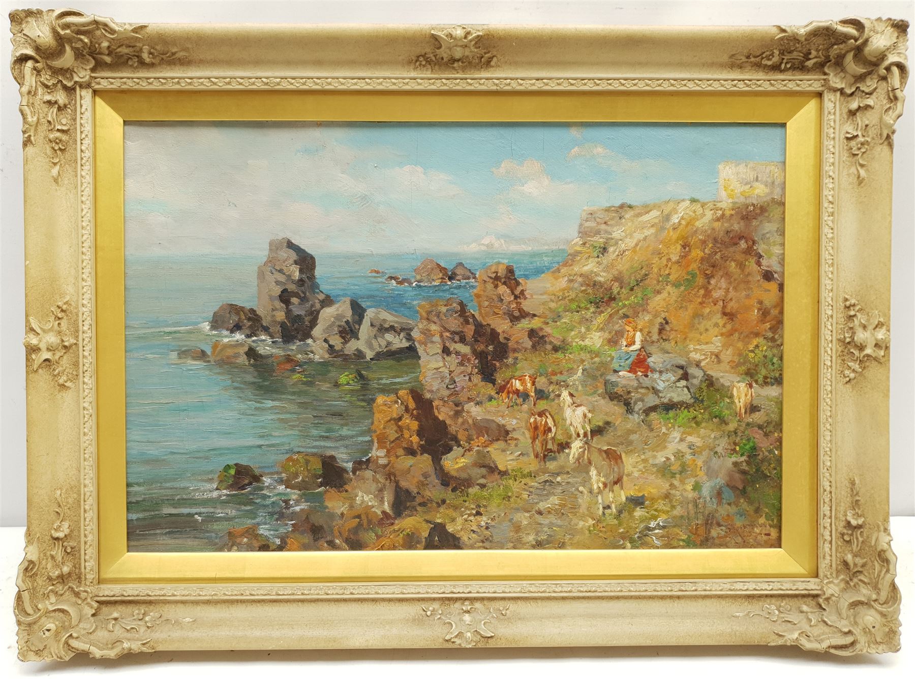 Giuseppe Giardiello (Italian 1877-1920): Girl with Goats on a Rocky Coast, oil on board signed 33cm x 51cm