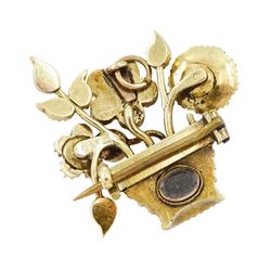 19th / 20th century gold multi gemstone set flower basket brooch, the flowers set with garnets, amethysts, seed pearls and turquoise, in a seed pearl woven basket, with a glazed back