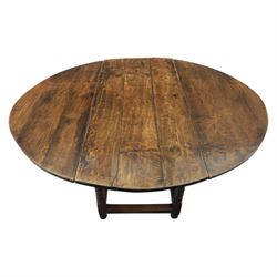 18th century country oak oval dining table, plank top with two drop leaves and gate-leg action, single drawer, raised on bobbin turned legs