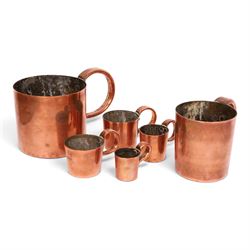 Set of six 19th century copper tankard measures comprising 1/2 Gallon, Quart, 1/2 Pint and...