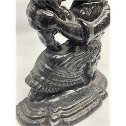 Cast iron moulded doorstop in the form of Punch and Judy, H29cm