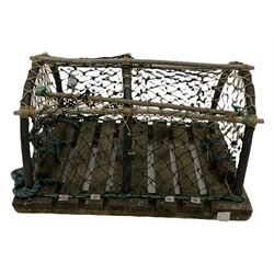 19th century cast iron water pump (H157cm), and a crab trap