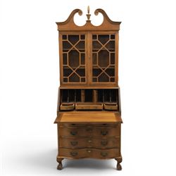 Maddox of Jamestown New York - Georgian design mahogany bureau bookcase, broken arch pediment with central finial, astragal glazed bookcase, above a fall front writing slope with fitted interior, four serpentine drawers, raised on claw on ball feet 