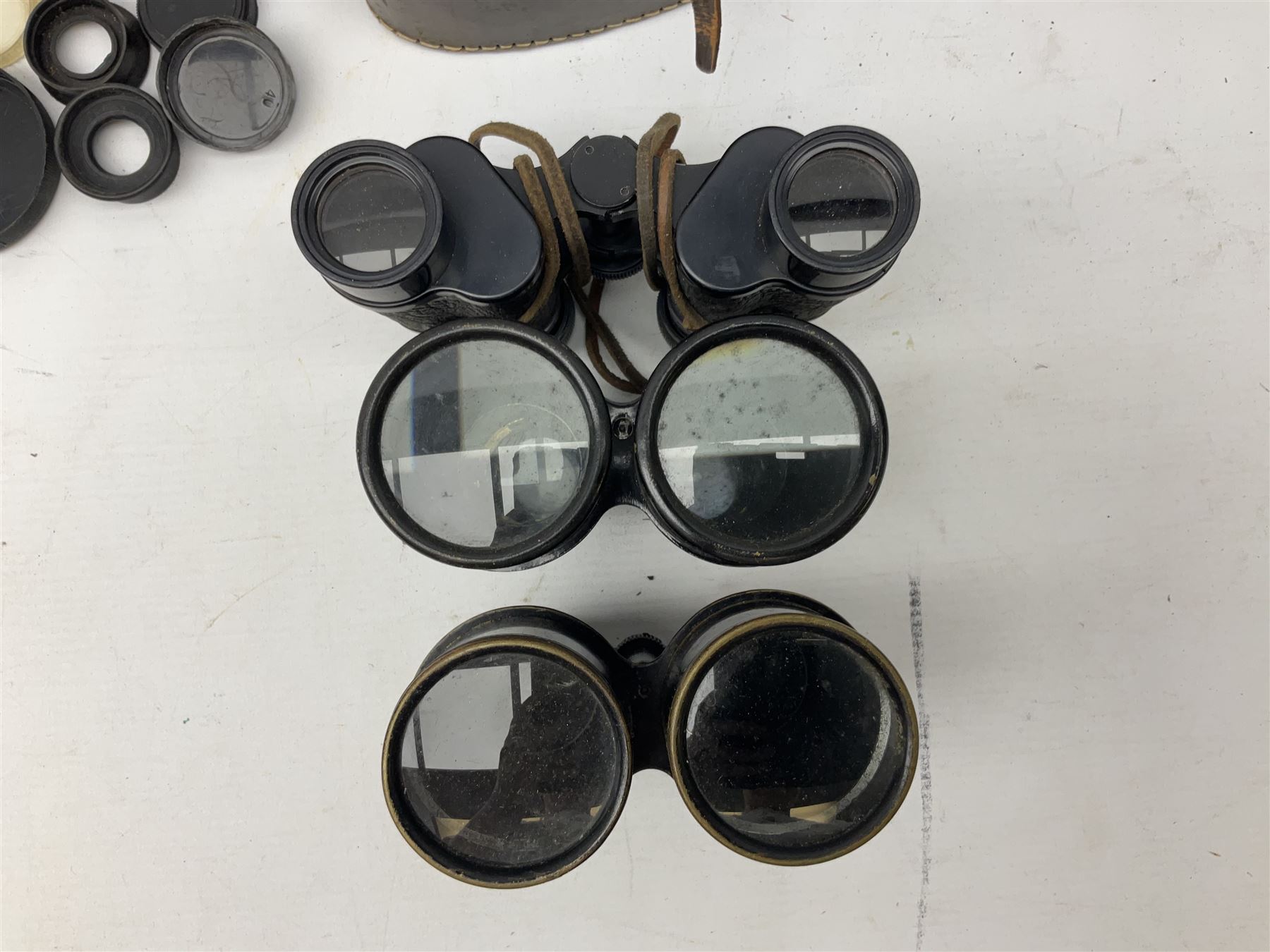 Nine binoculars to include Prinz 10x50, Prinzlux 10x50,  Ellgee Cadet 8x25, Mark Scheffel 35x50 etc, eight with cases