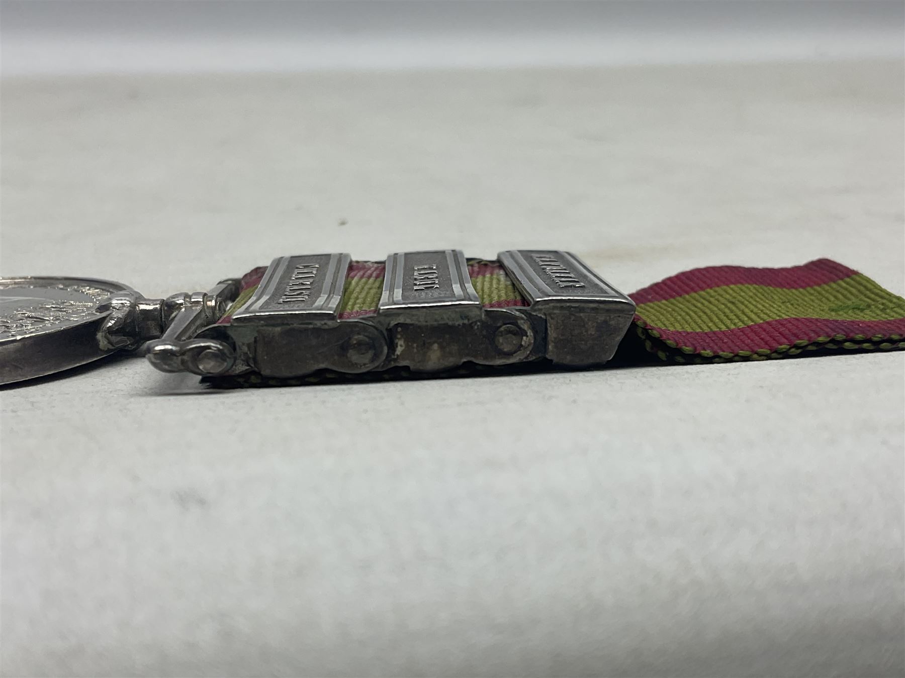 Victoria 2nd Afghanistan War Medal 1878-79-80 with three clasps for Kandahar, Kabul and Charasia, name erased, with ribbon