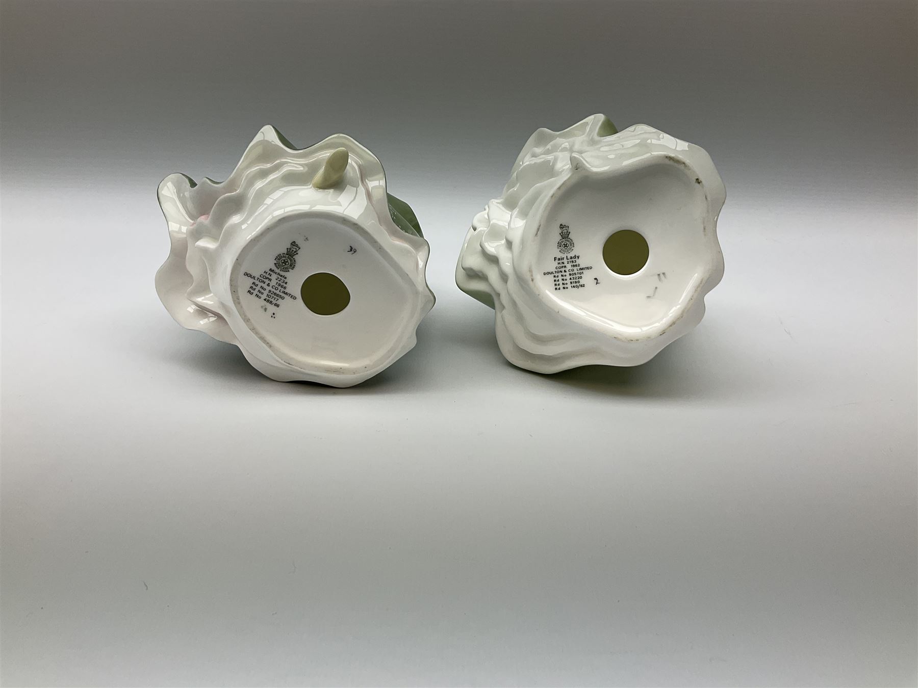 A group of eight Royal Doulton figures, comprising Simone HN2378, Amy HN3854, Fragrance HN2334, Louise HN3207, Adrienne H2304, Michele HN2234, Fine Lady HN2193, Winsome HN2220 and a Coalport figure, Polly. 