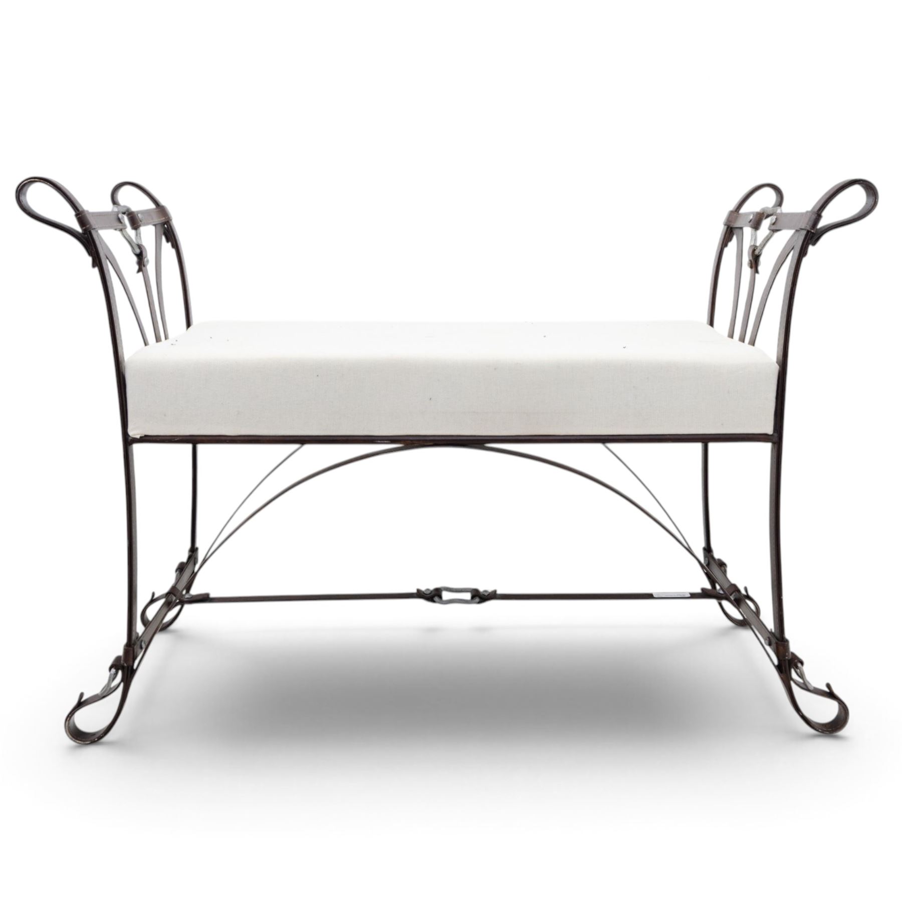 And So To Bed - 'Handel' wrought iron window seat, the rectangular upholstered seat enclosed by scrolling and arched ends with shaped uprights, on scrolling supports united by curved stretchers