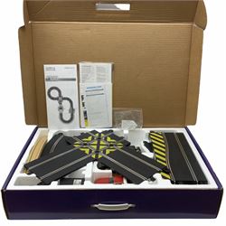 Scalextric - Marks & Spencer Starsky & Hutch set with '76 Gran Torino and Chevrolet Corvette cars, boxed; an earlier Tri-ang Scalextric 'Set 30' Model Motor Racing set containing Lotus and Cooper racing cars with controllers, track, figures and instruction pack, boxed; and a Scalextric catalogue Fifth edition c1964