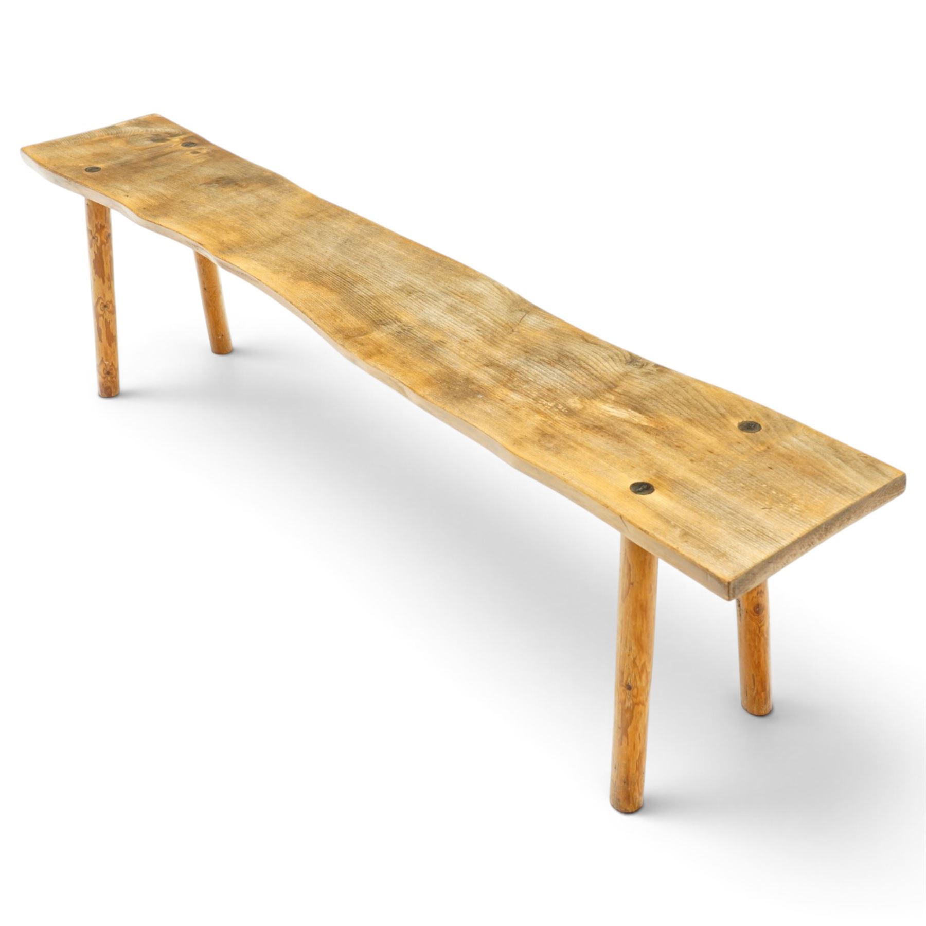 Mid-20th century live-edge bench or coffee table, raised on cylindrical supports