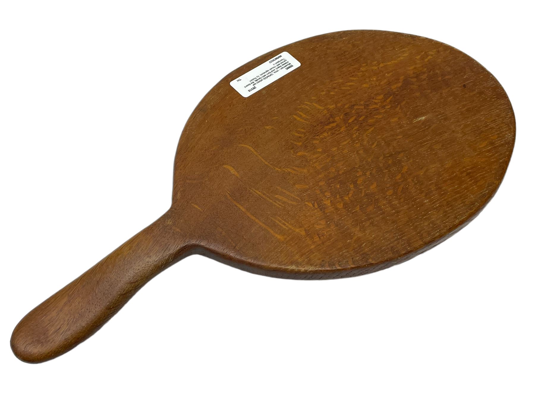 Mouseman - circa. 1940s/50s adzed oak cheese board, oval form with handle, the board carved with mouse signature, by Robert Thompson of Kilburn, L37cm D18cm 