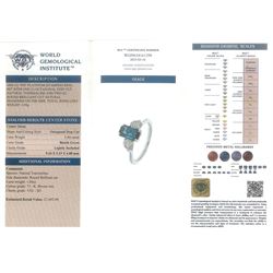 Platinum green tourmaline and diamond three stone ring, single octagonal cut tourmaline of 1.54 carat, with a single round brilliant cut diamond set either side, stamped Plat 950, total diamond weight 1.06 carat