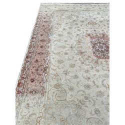 Persian Mahal densely knotted ivory ground carpet, floral rosette medallion surrounded by interlacing leafy branches and palmettes, scrolling border decorated with foliate motifs, within guard stripes, with signature panels to each end