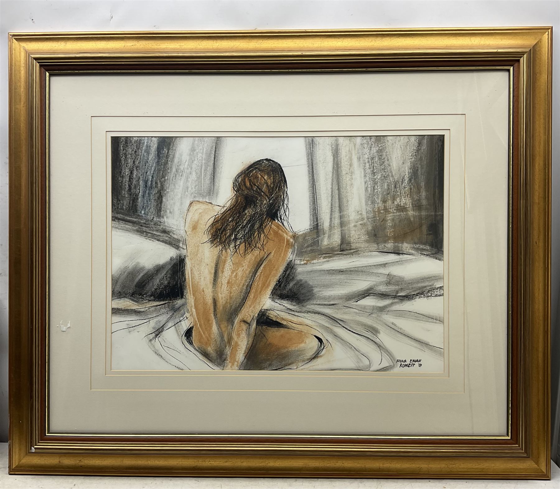 Fiona Ewan Rowett (South African 1948-): Reclining Female Nude, pastel and charcoal on paper signed and dated '01, 48cm x 68cm 