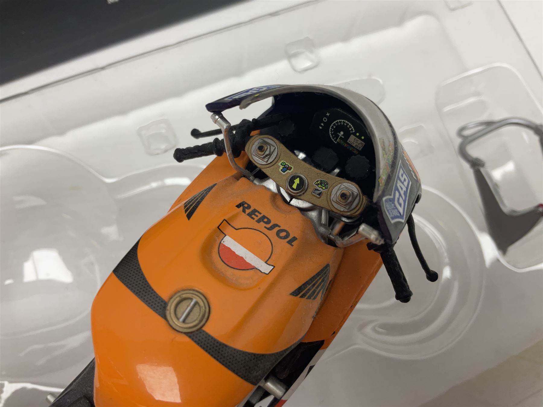 Three Ixo Models 1:12 scale die-cast models of motorcycles - BRB007 Honda NSR500 Michael Doohan 1998; BRB001 Honda RC211V Valentino Rossi 2003; and Yamaha YZR-M1 Colin Edwards MotoGP Phillip Island 2007; all boxed (3)