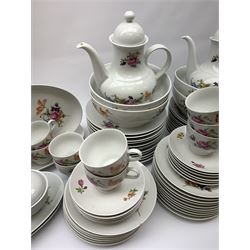 JLmenau German tea and dinner wares, comprising twelve dinner plates, seventeen side plates, twelve bowls, four large serving bowls, pair of oval serving platters, pair of smaller examples, two coffee pots, eleven teacups, twelve saucers, two milk jugs, two larger jugs, and two lidded sucriers. 