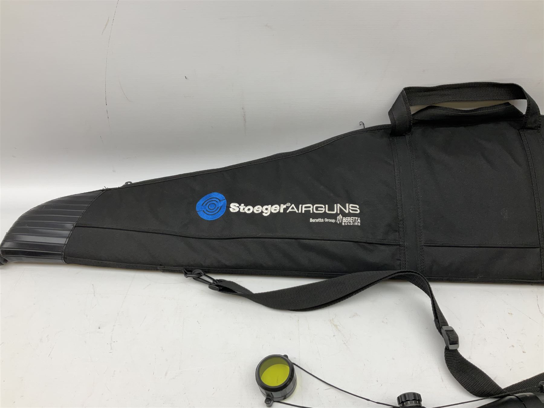 Stoegar .177 air rifle with break barrel action, 3 x 9 telescopic sight and fully integrated sound moderated barrel, no visible serial number, L109cm; in Stoeger lined gun sling