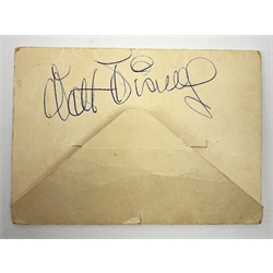 Walt Disney (1901-1966), American Animator, Academy Award Winner, signed letter card in blue ink, the envelope folding out to reveal six views in black and white of Romney, Hythe and Dymchurch Railway, and hand written letter detailed 'This afternoon we were talking to Walt Disney down at Dungeness, that's his autograph on the back of the card, he was driving one of the miniature trains.', post marked indistinct, dated 52. 