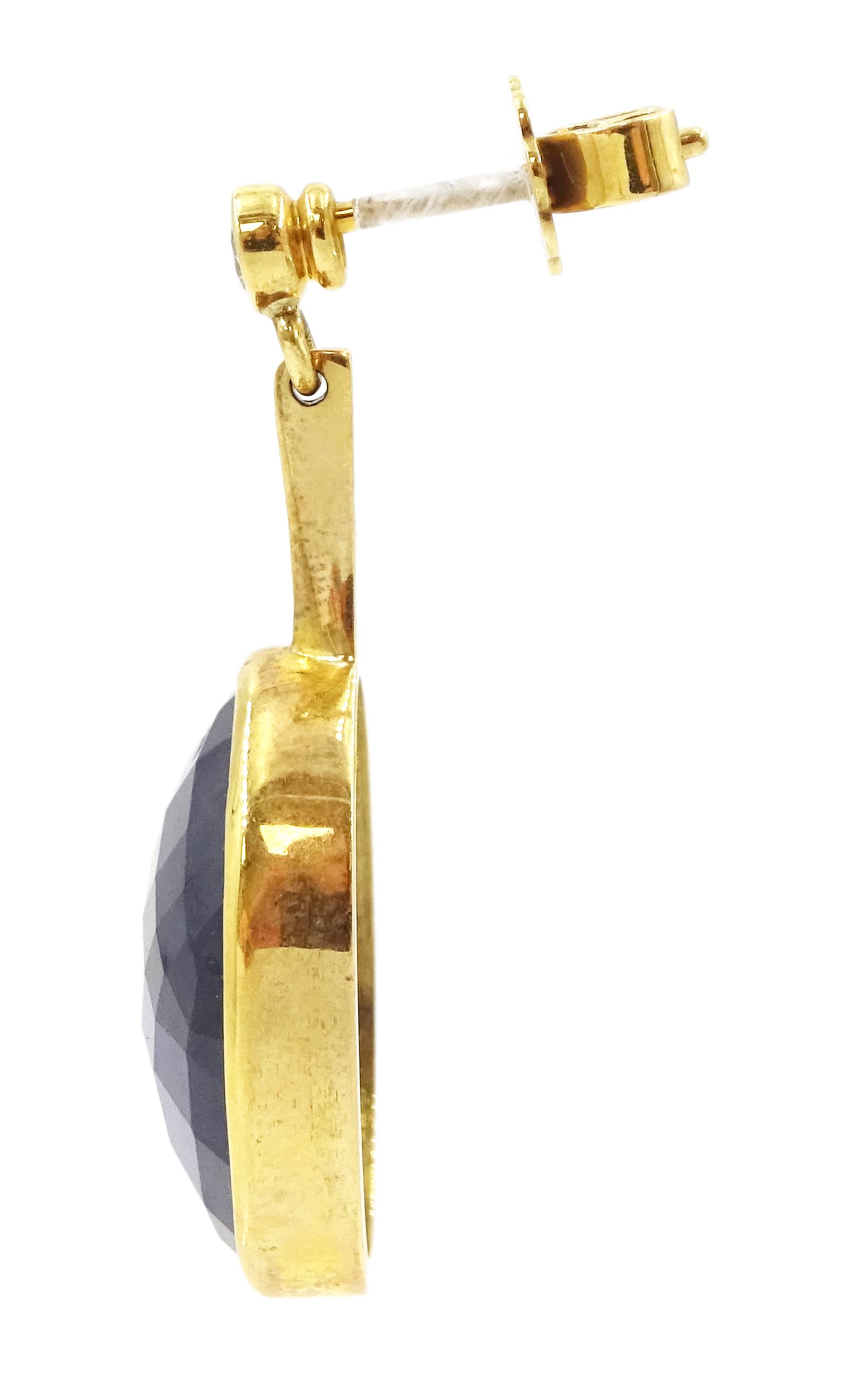 Pair of 18ct gold sapphire and diamond pendant earrings, each stud set with a single briolette oval cut sapphire, suspending from a single round brilliant cut diamond, hallmarked, total sapphire weight approx 40.00 carat, total diamond weight approx 0.20 carat