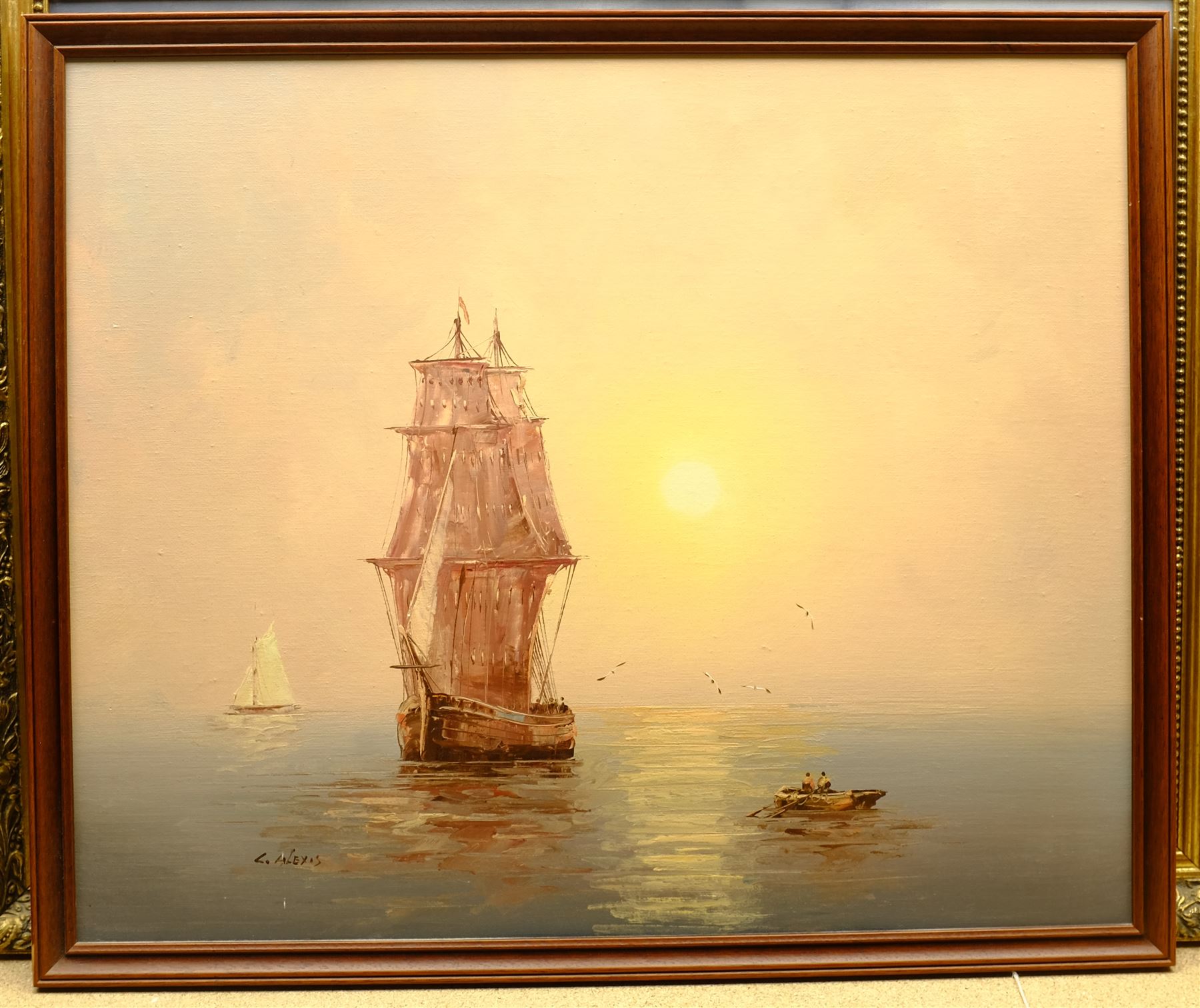 K Kirby (20th century): 'Mighty Sea', oil on board signed, titled verso 49cm x 65cm; C Alexis (20th century): Sailing Barge Becalmed, oil on canvas signed 50cm x 60cm (2)