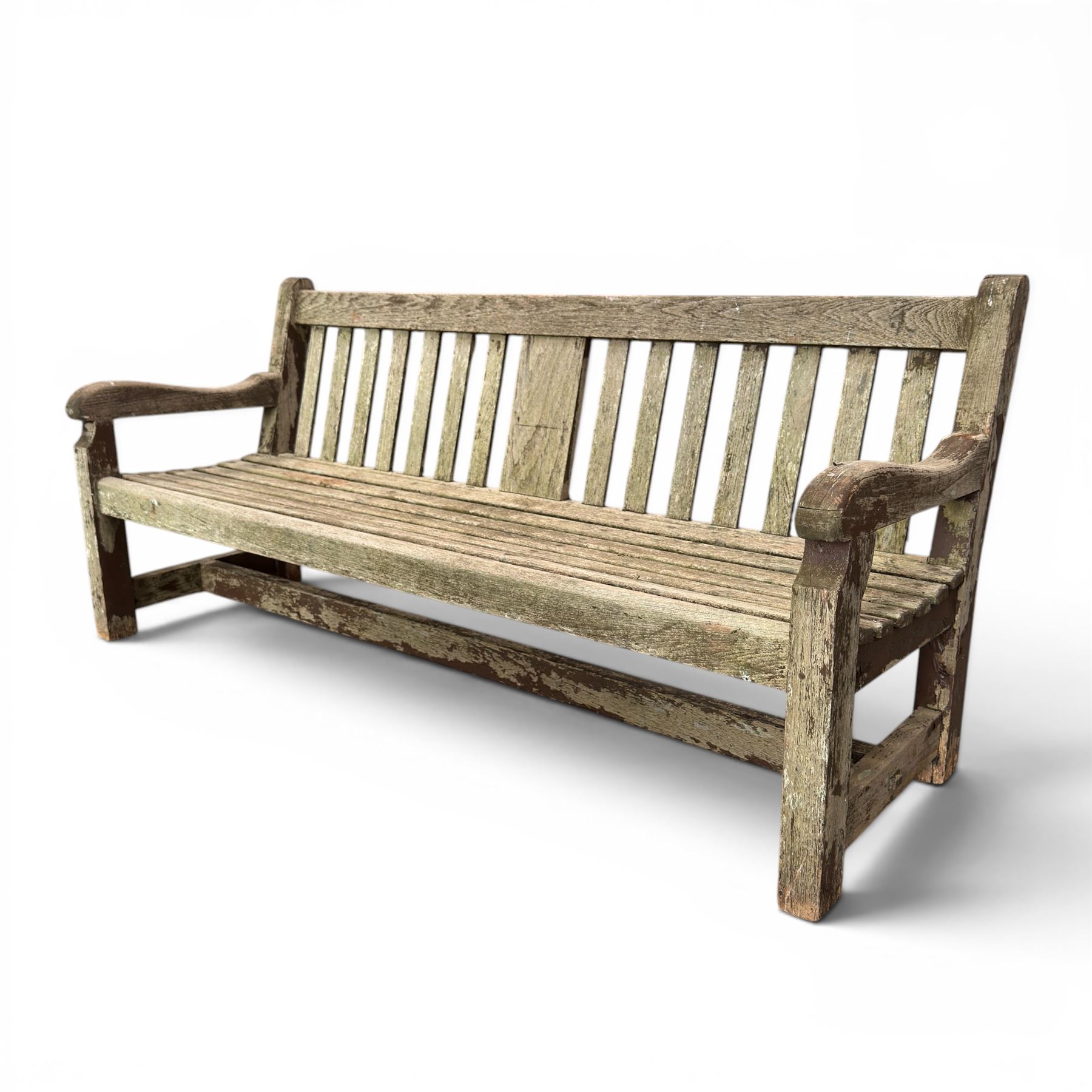 Teak garden bench with slatted back and seat raised on square supports