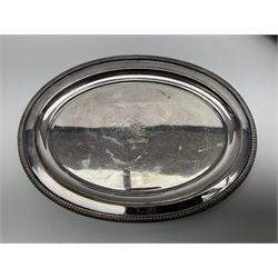 Pair of Mappin and Webb silver plate pierced pedestal bon bon dishes, together with other silver plate comprising teapot stand engraved with lion's head to centre, two cut glass claret jugs, two bottle coasters with acorn decoration, two open salts upon dolphin mounts, tea caddy, three piece cruet set and a large oval tray with pierced sides and upon four ball feet