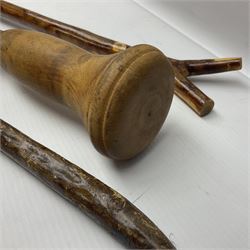 Four late 19th/early 20th century walking canes, to include a stained wooden example, the curved handle carved and painted as the racehorse Churchtown Boy, together with a plain wooden cane with pine pommel and two others, tallest H136cm