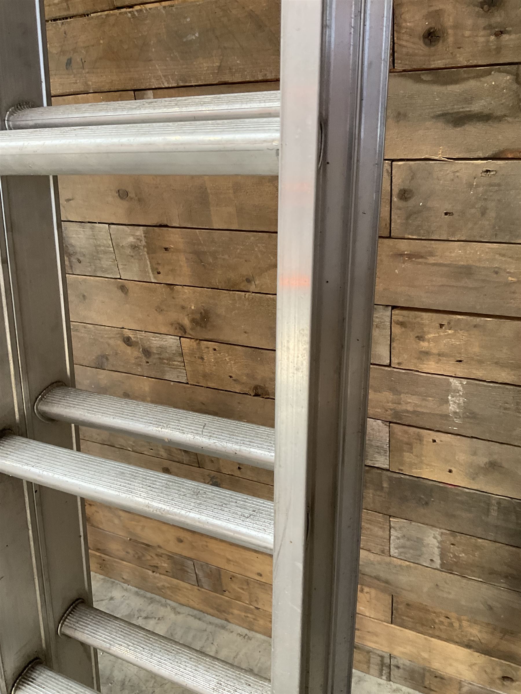 Abru pair of aluminium extendin ladders, 3.4m - 6.1m