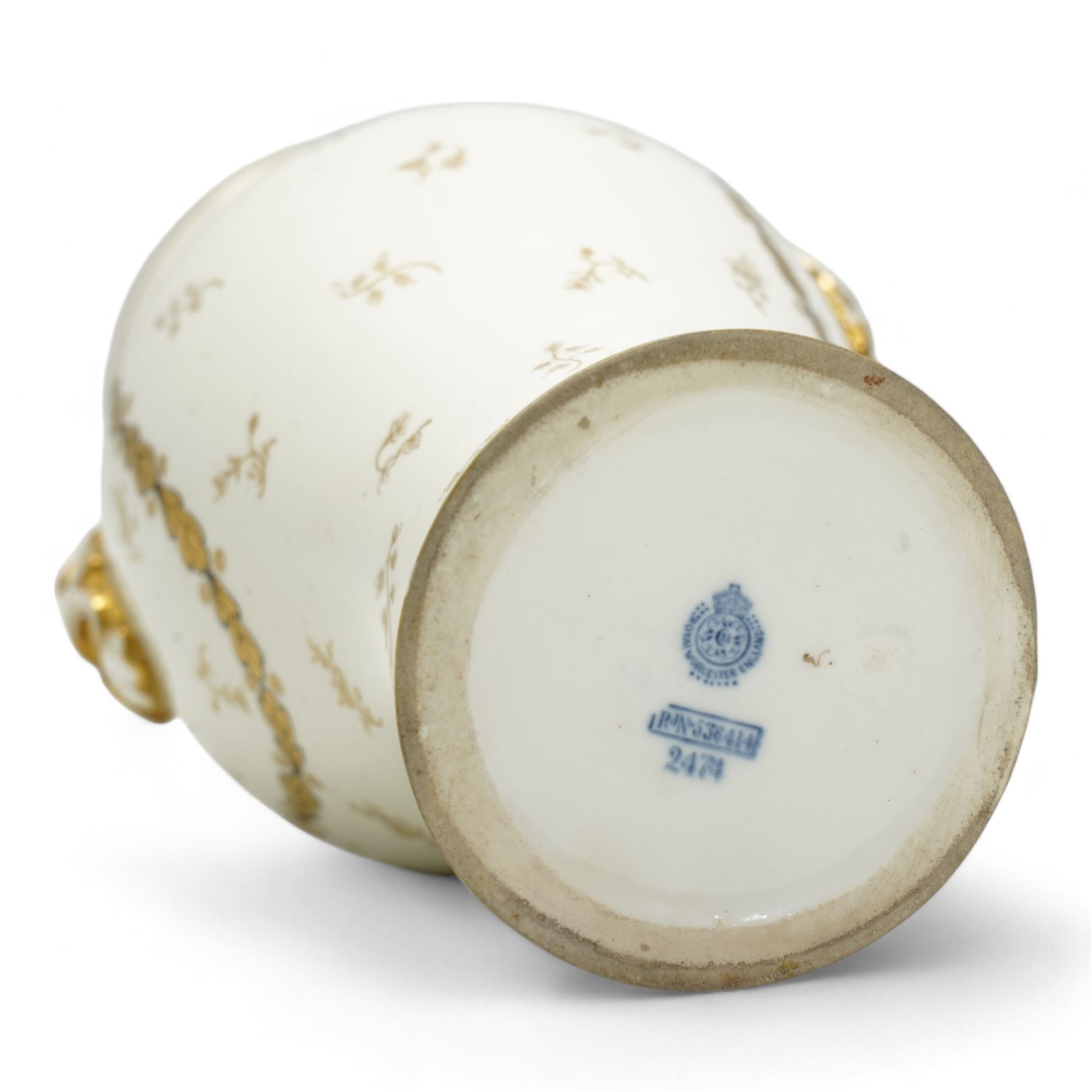 Early 20th century Royal Worcester porcelain twin handled vase, circa 1910, painted with a basket of flowers by Ernest Phillips, within an oval gilt border, the plain ground decorated with gilt sprigs and trailing oak leaves, signed, printed marks beneath, H21.5cm