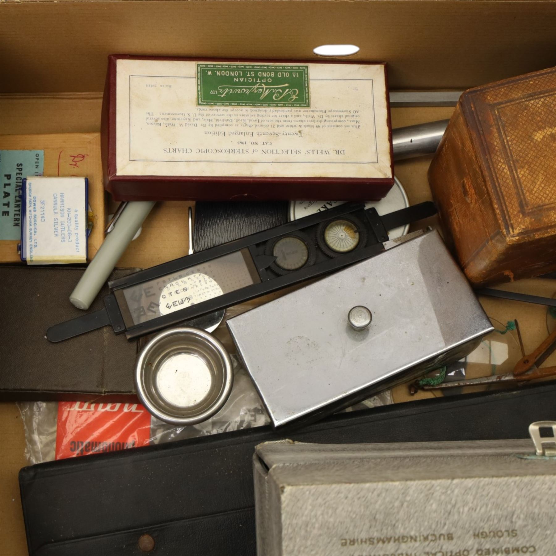 Carriage clock in brass and bevelled glass case and outer leather travelling case, stereo viewer, box of Dr Wells Stereoscopic Charts, large Monarch magnifying glass and other optical items